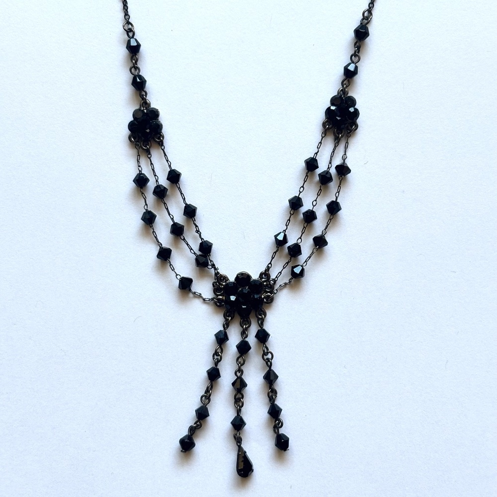 Vintage black metal necklace with flower detail and antique silver finish chain